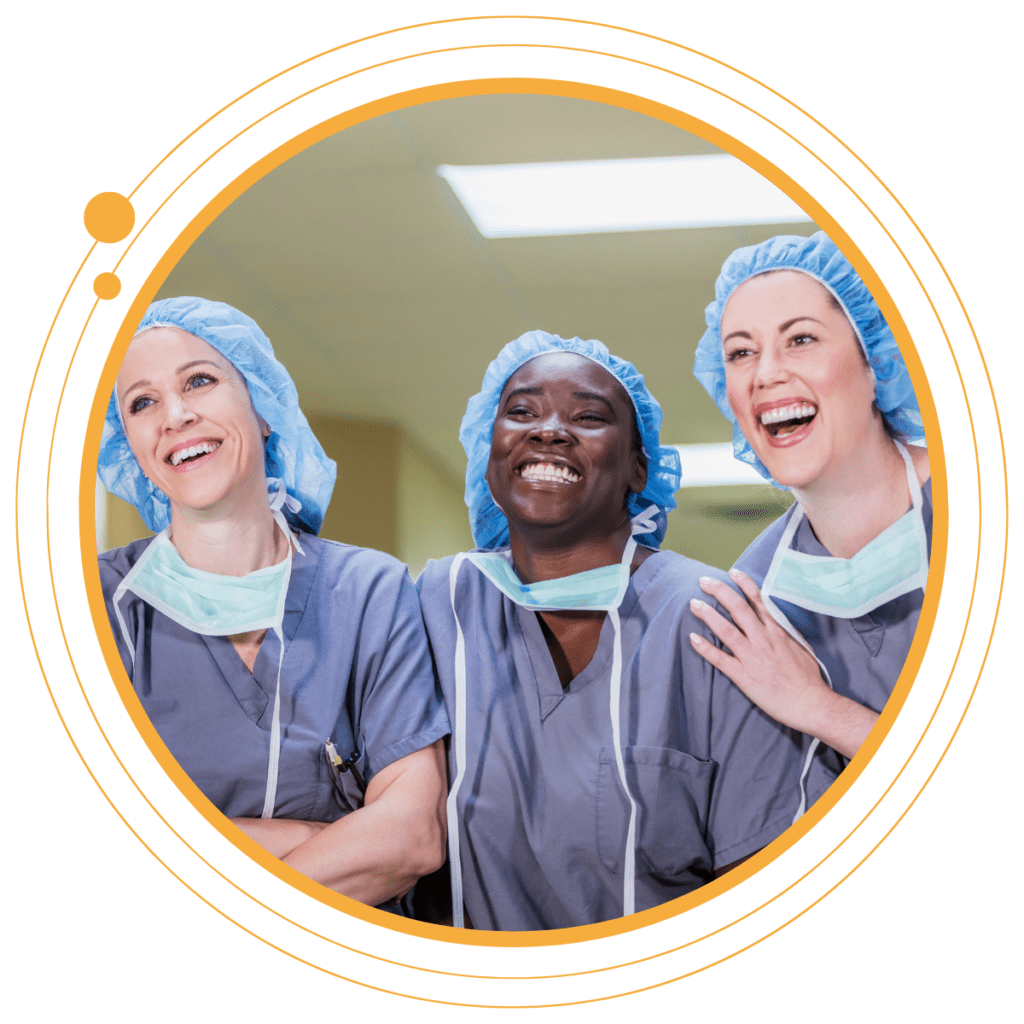 a group of nurses smiling together