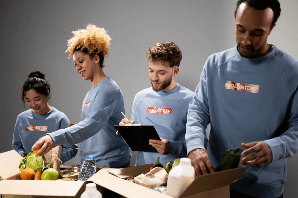  volunteers packing donations in the room