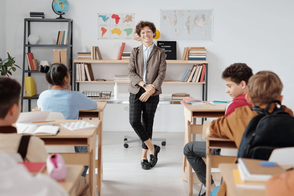 smiling teacher in a classroom