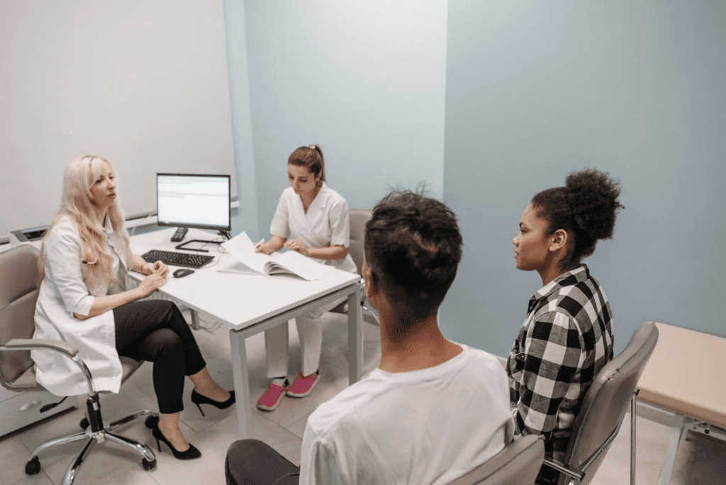 couple sitting at a doctors clinic