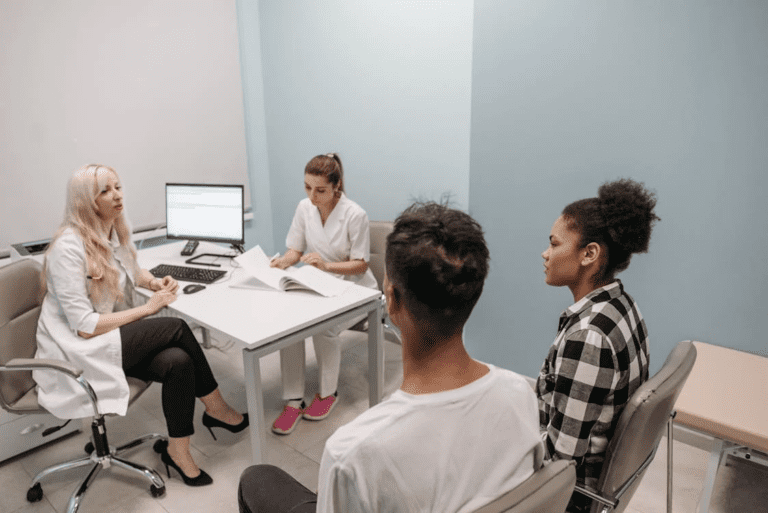 couple sitting at a doctors clinic