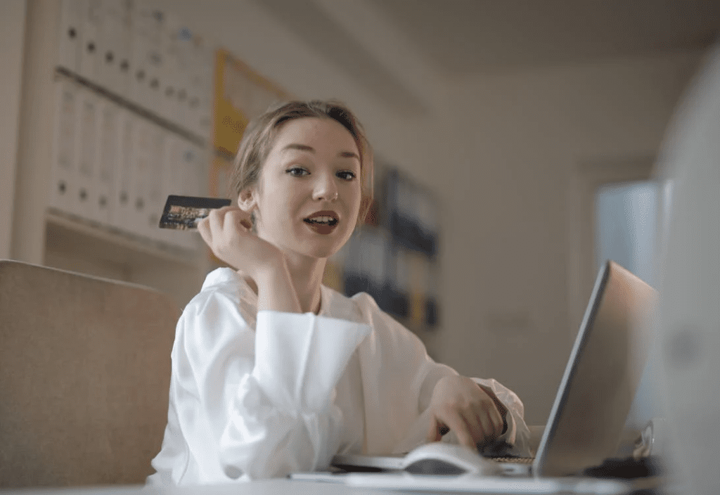 woman holding a credit card