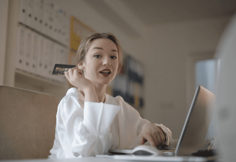 woman holding a credit card