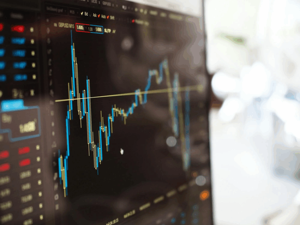  close up of a computer monitor with trading data on screen